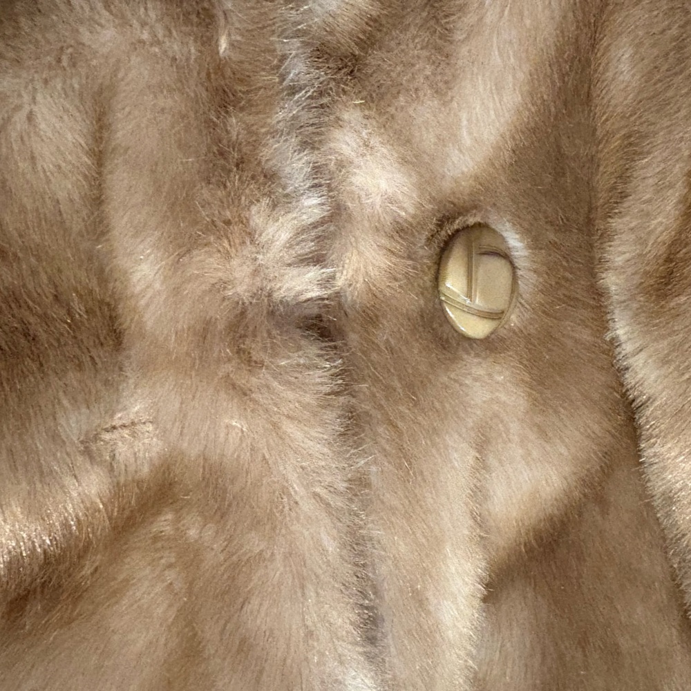 Fur coat. Sm to med. Lined with satin fabric. Real fur.